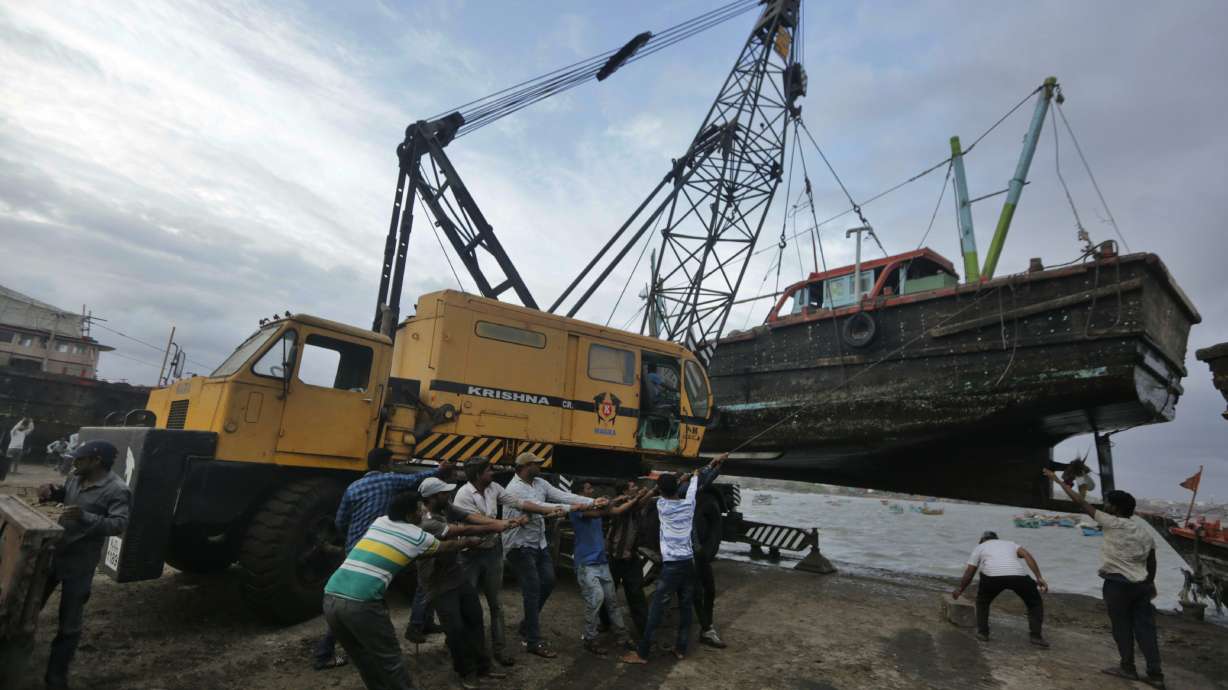 Cyclone batters fishing hub but veers away from Indian coast