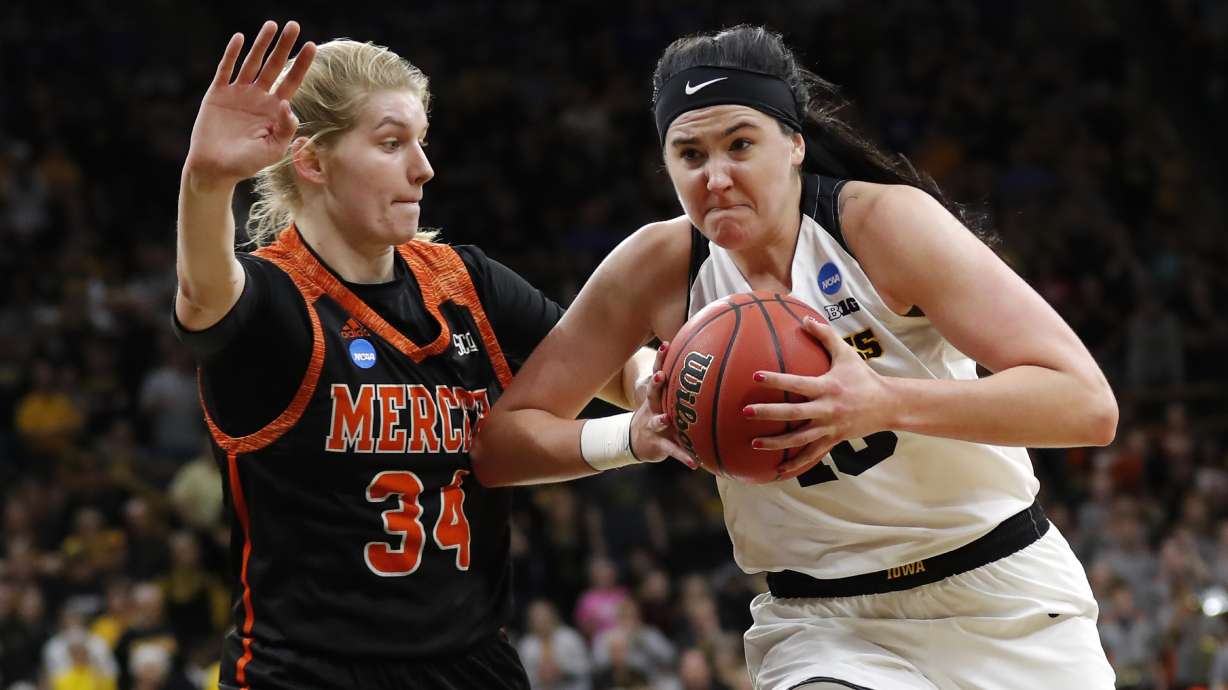 Wings re-sign AP Player of the Year Megan Gustafson