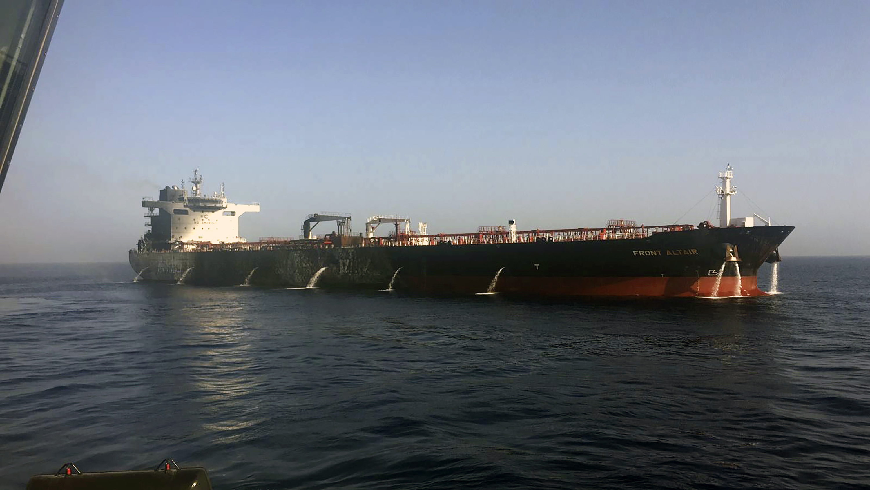 US says video shows Iran removing mine from stricken tanker