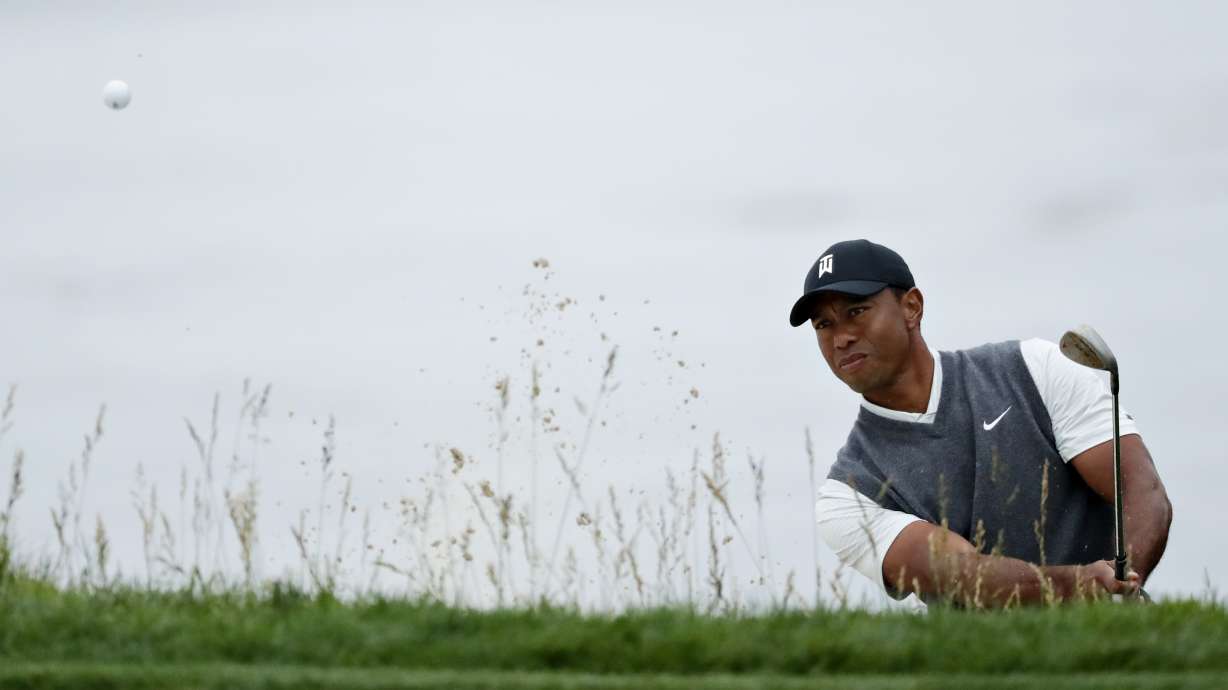 Woods posts 1st round under par at US Open in 7 years