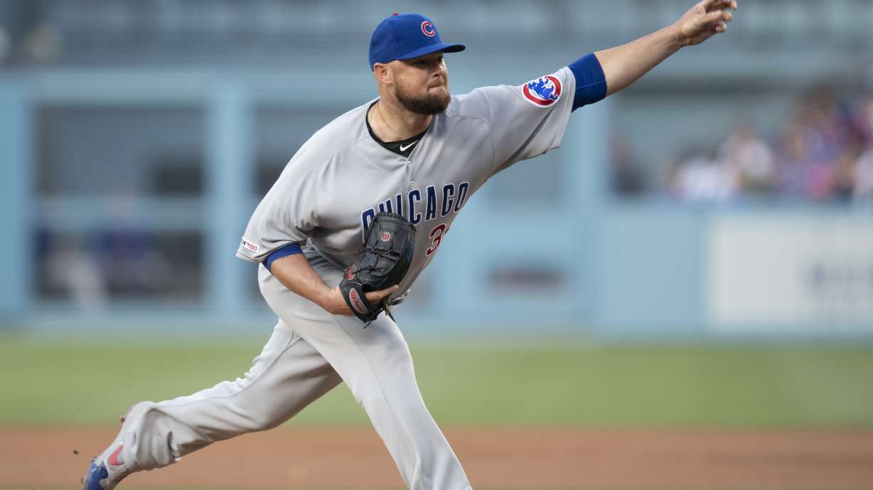 Dodgers outslug Cubs with 4 homers to win 7-3