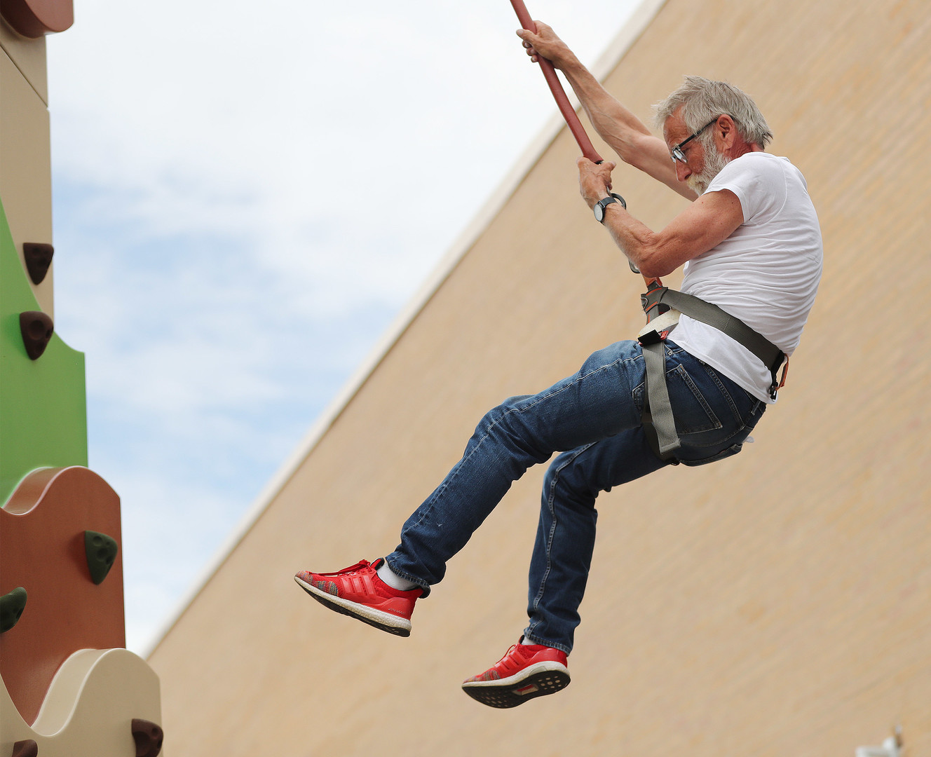 Veteran Bill Hughes scales a climbing wall during a Recreation Fair at the George E. Wahlen Department of Veterans Affairs Medical Center in Salt Lake City on Friday, June 14, 2019. (Photo: Jeffrey D. Allred, Deseret News)