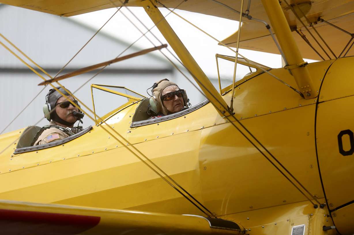 Doug Compton takes retired Air Force Lt. Col. Bill Willis, 97, for a ride in a Boeing-Stearman from the Morgan County Airport in Morgan on Friday, June 14, 2019. (Photo: Kristin Murphy, KSL)