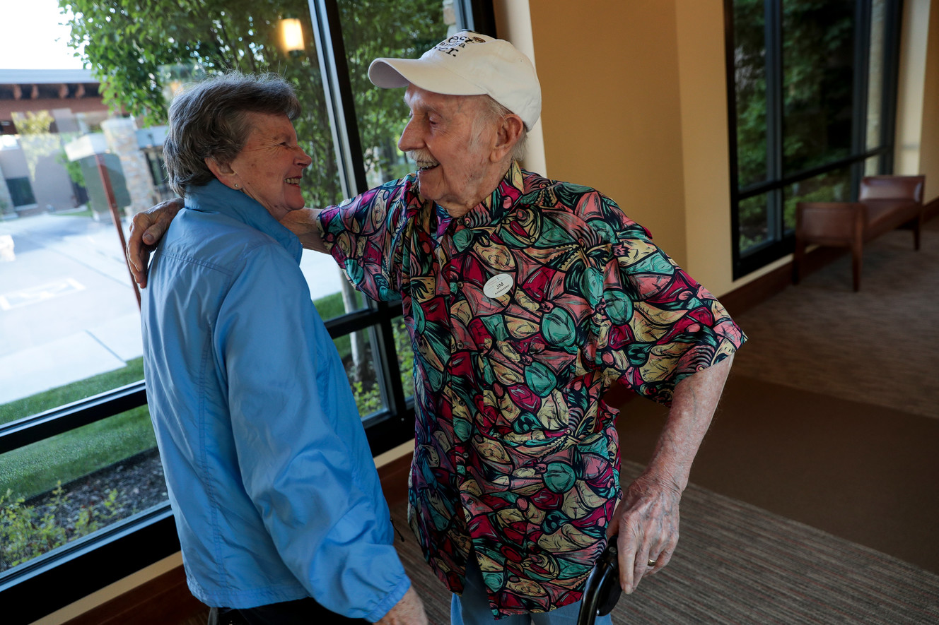 Jim Broadwater, 97, greets Bobbie Young while walking the halls at the Sagewood at Daybreak senior living center in South Jordan on Saturday, May 25, 2019. (Photo: Spenser Heaps, KSL)