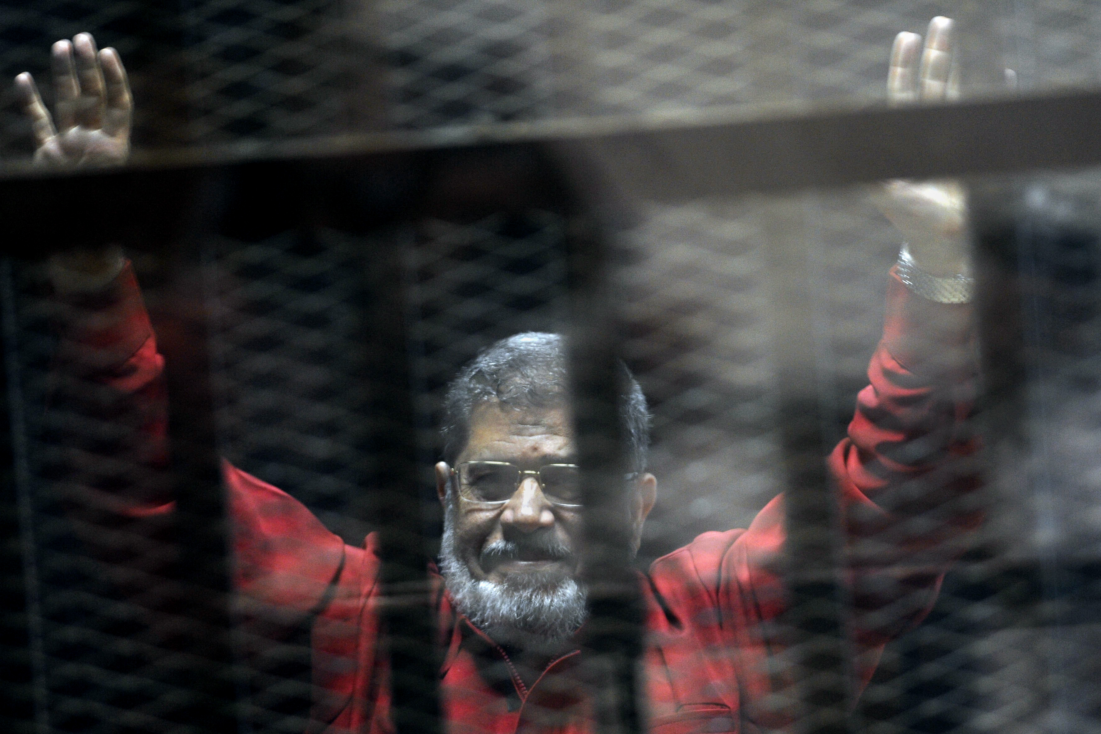 The Latest: Amnesty urges Egypt to investigate Morsi's death