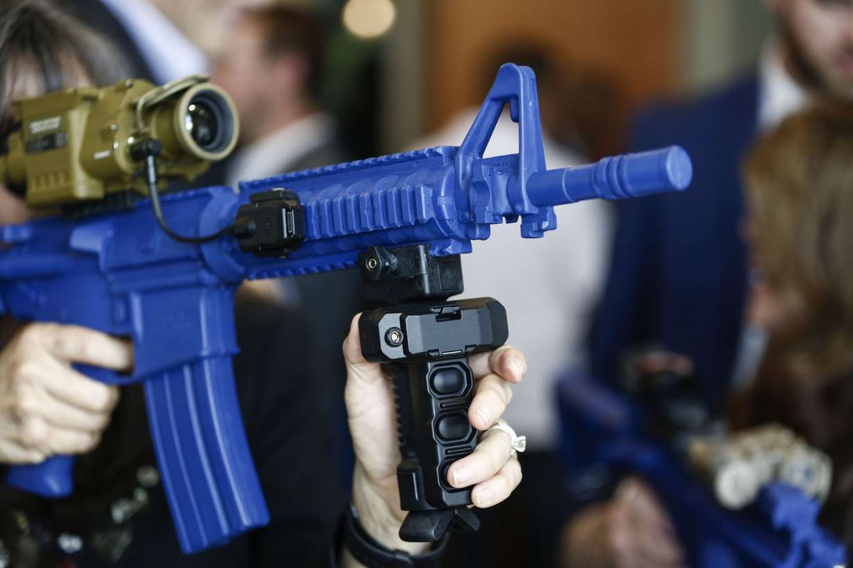 Kearston Cutrubus checks out Australia-based KordTech technology during a ribbon-cutting ceremony and open house for company's new facility in Ogden on Monday, June 17, 2019. Photo: Silas Walker, KSL