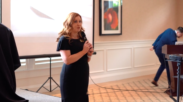 CEO of LDS Matchmakers, Amy Stevens Seal, speaks to the women before the bachelor is revealed at the VIP event Friday, June 7, 2019. (Photo: Courtesy of LDS Matchmakers)
