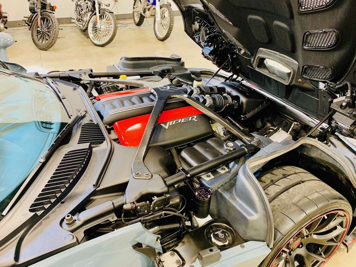 Kyle Nelson's custom 2016 Dodge Viper GTC ACR Extreme has an extremely large 8.4 liter V-10 engine mounted just behind the front wheels. (Photo: George Giles)