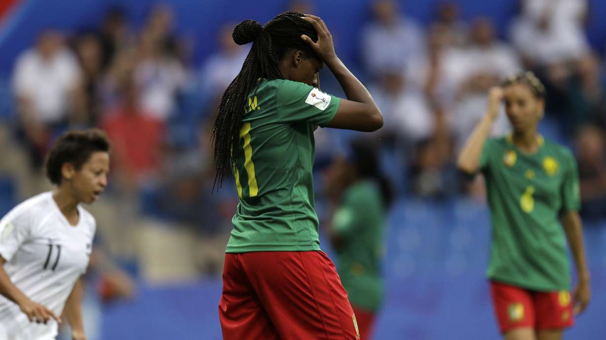 Cameroon beats New Zealand 2-1 to reach round of 16