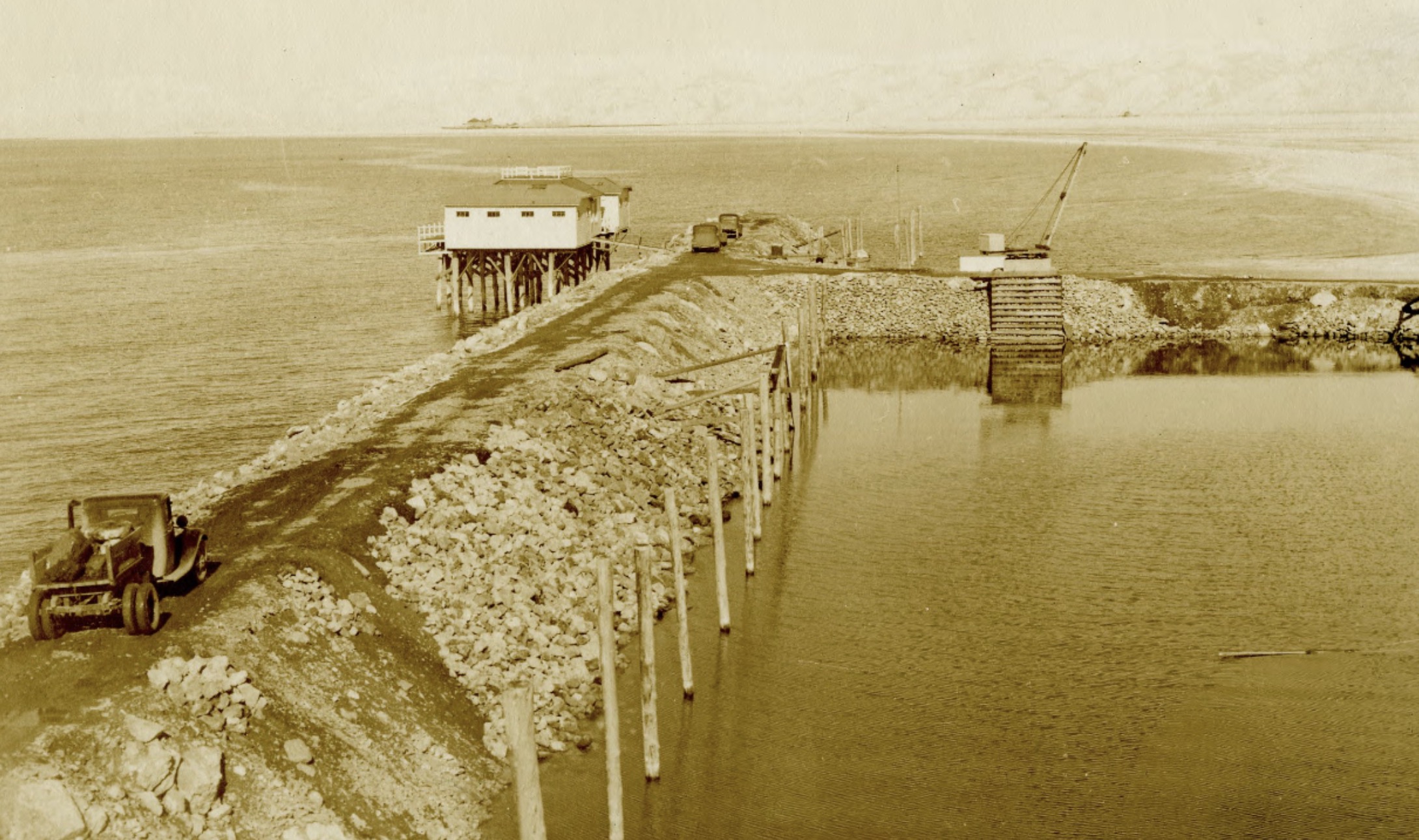 An undated photo of the construction of the causeway connecting Syracuse with Antelope Island in the 1960s. Newspaper reports from the time indicate the causeway was built from 1964 to 1969. It later flooded in the 1980s and had to be repaired. (Photo: Utah State History)