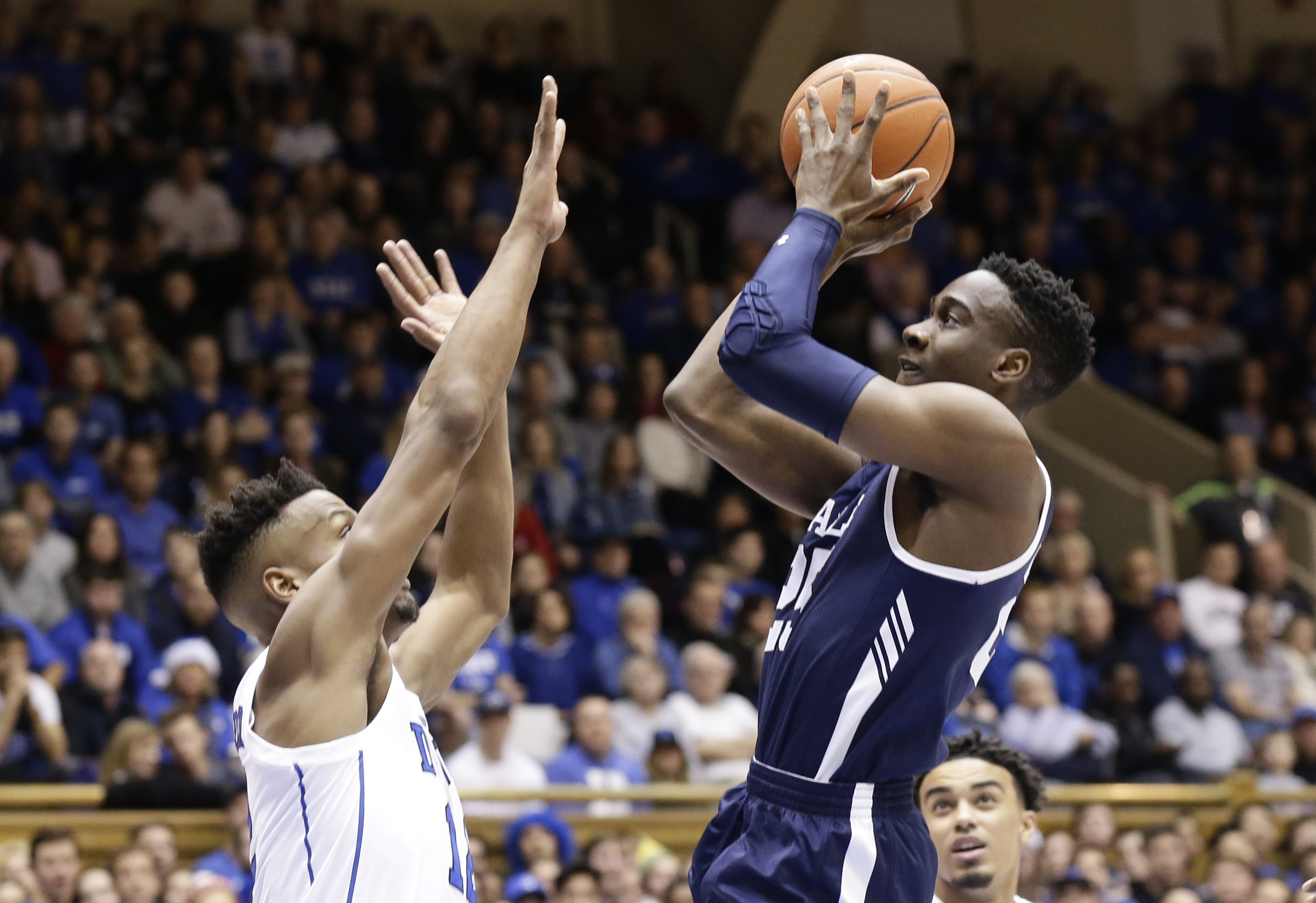 Duke's Javin DeLaurier defends against Yale's Miye Oni during the first half of an NCAA college basketball game in Durham, N.C., Saturday, Dec. 8, 2018. (Photo: Gerry Broome, AP)