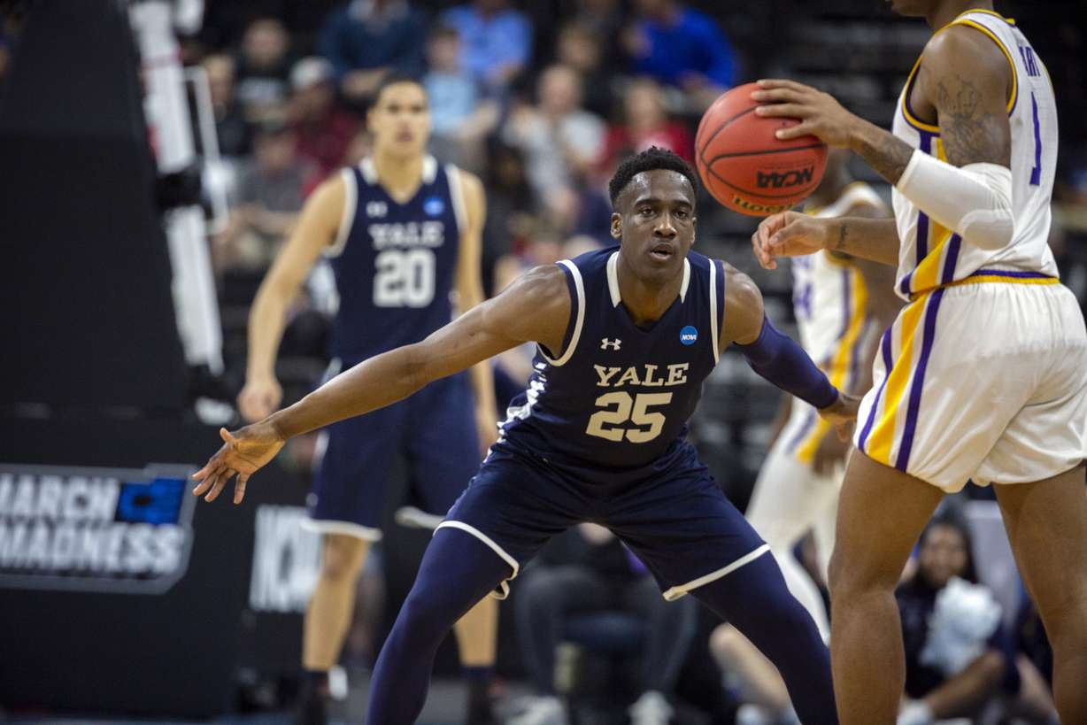 Yale guard Miye Oni (25) defends LSU guard Javonte Smart (1) during the first half of the first round men's college basketball game in the NCAA Tournament, in Jacksonville, Fla. Thursday, March 21, 2019. (Photo: Stephen B. Morton, AP)