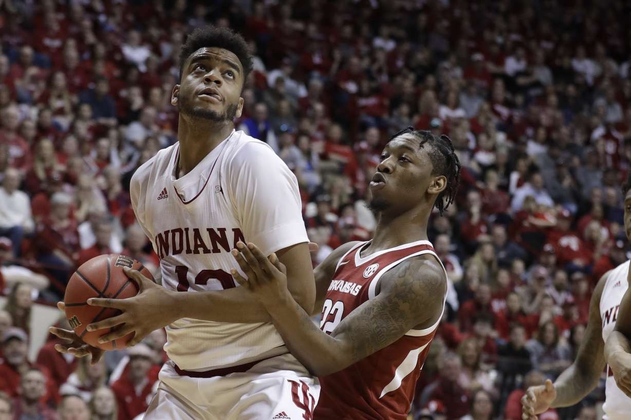 Indiana's Juwan Morgan (13) puts up a shot against Arkansas's Gabe Osabuohien (22) during the second half in the second round of the NIT college basketball tournament, Saturday, March 23, 2019, in Bloomington, Ind. Indiana won 63-60. (Photo: Darron Cummings, AP)