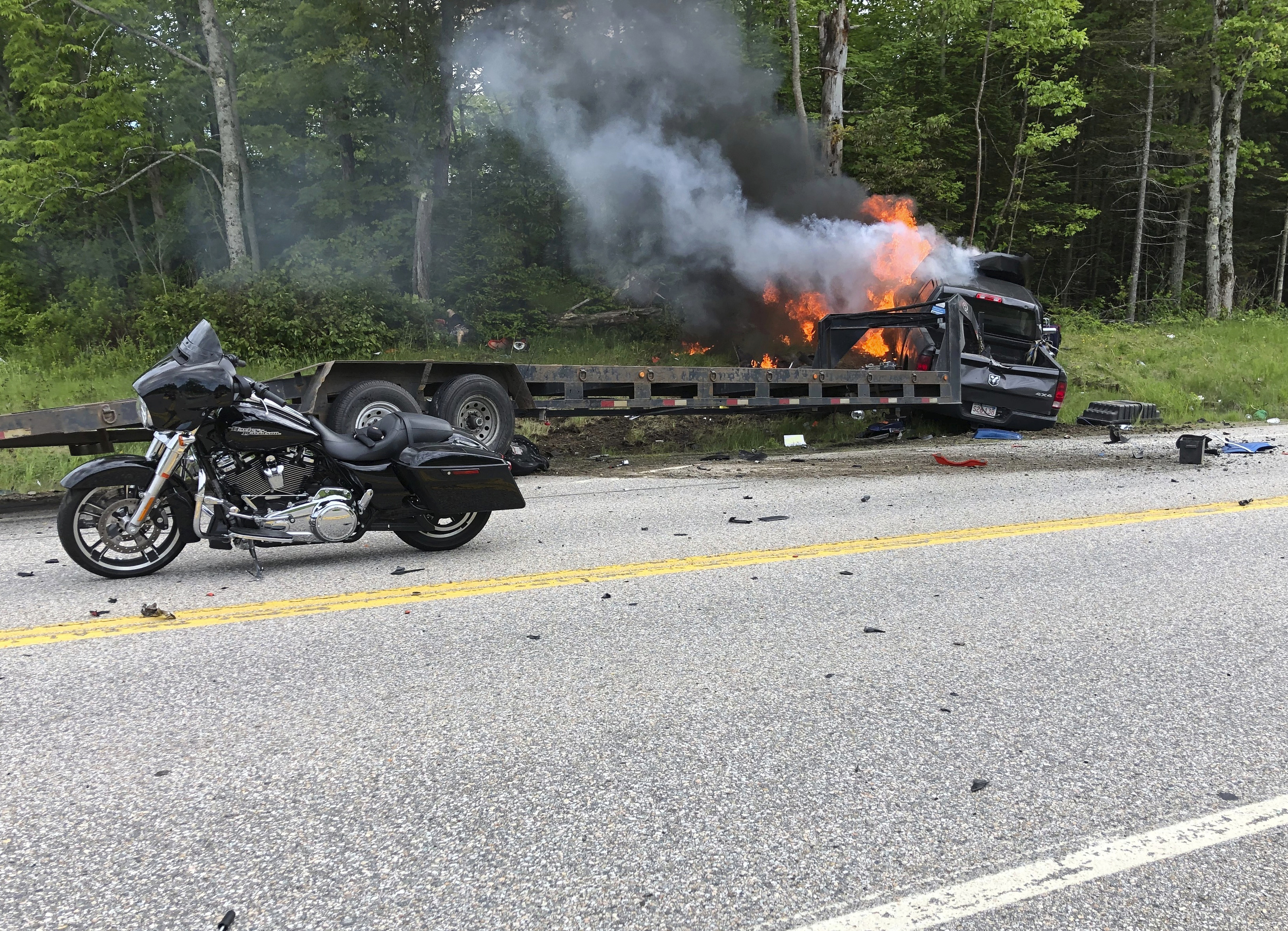 The Latest: Company linked to motorcycle crash cooperating