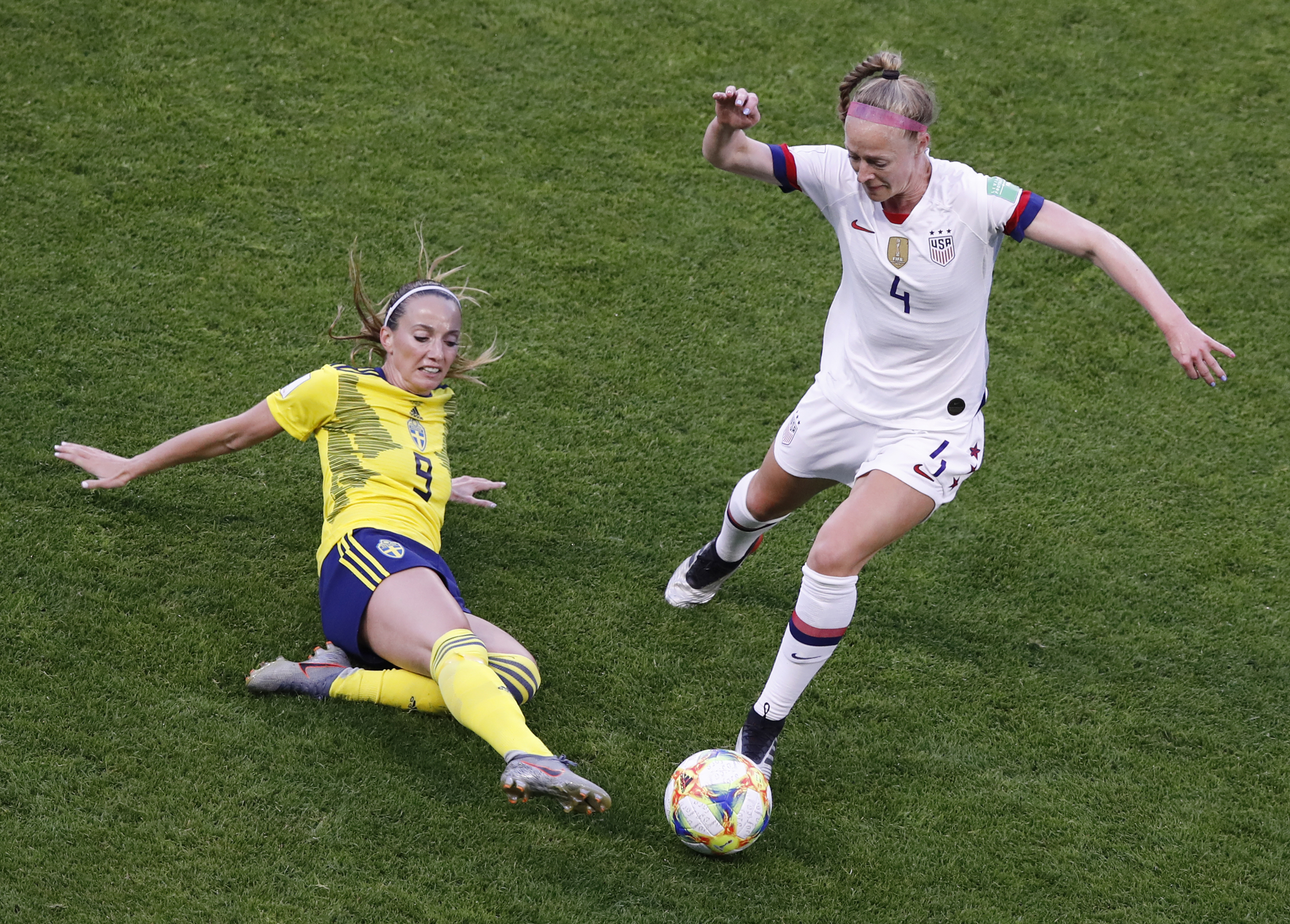 Sweden's Kosovare Asllani, left, and United States' Becky Sauerbrunn challenge for the ball during the Women's World Cup Group F soccer match between the United States and Sweden at the Stade Oceane in Le Havre, France, Thursday, June 20, 2019. (Photo: Christophe Ena, AP)