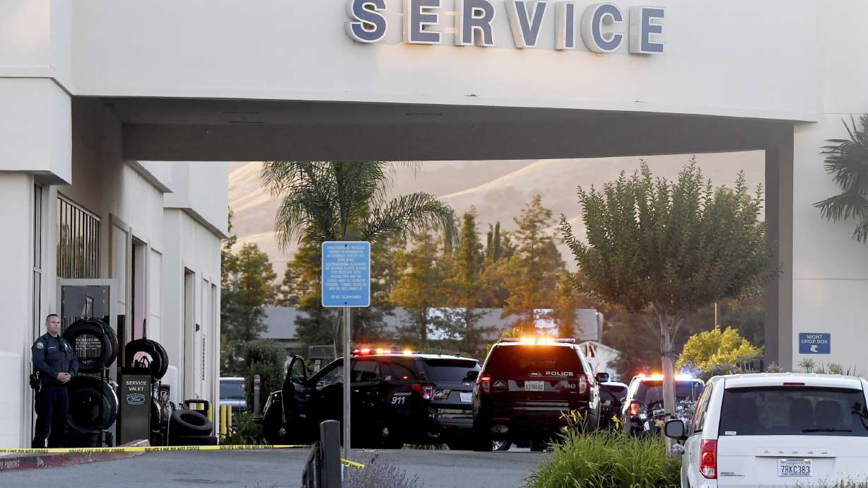 Police release IDs of gunman, 2 victims in dealership attack