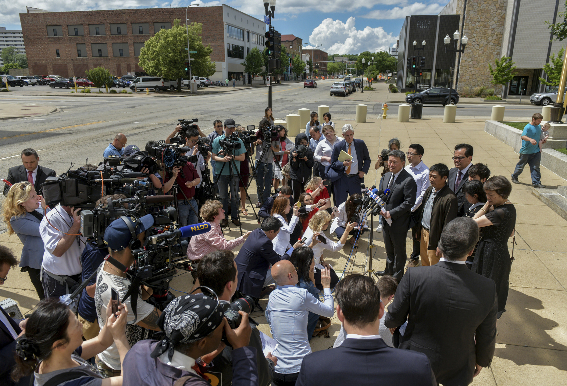 Defense: Chinese scholar's killer offered to locate body