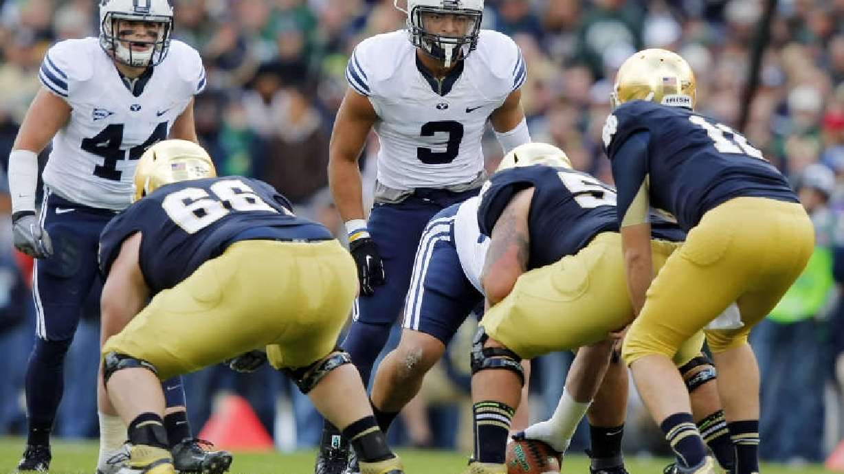 BYU's Brandon Ogletree, left, and Kyle Van Noy watch the Notre Dame offense as BYU and Notre Dame play Saturday, Oct. 20, 2012, in South Bend.