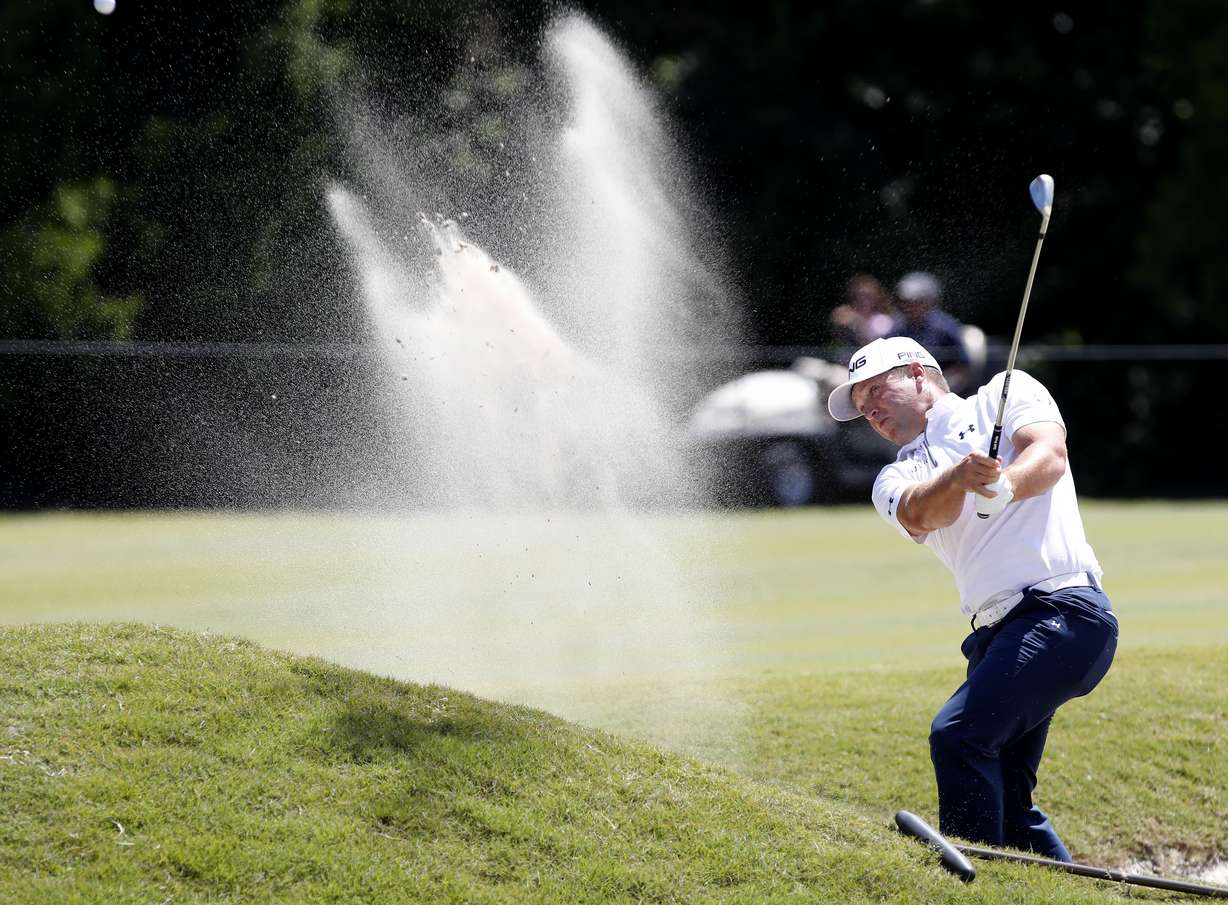 Daniel Summerhays hits out of the sand to the eighth green during the final round of the PGA Zurich Classic golf tournament's two-man team format at TPC Louisiana in Avondale, La., Sunday, April 29, 2018.