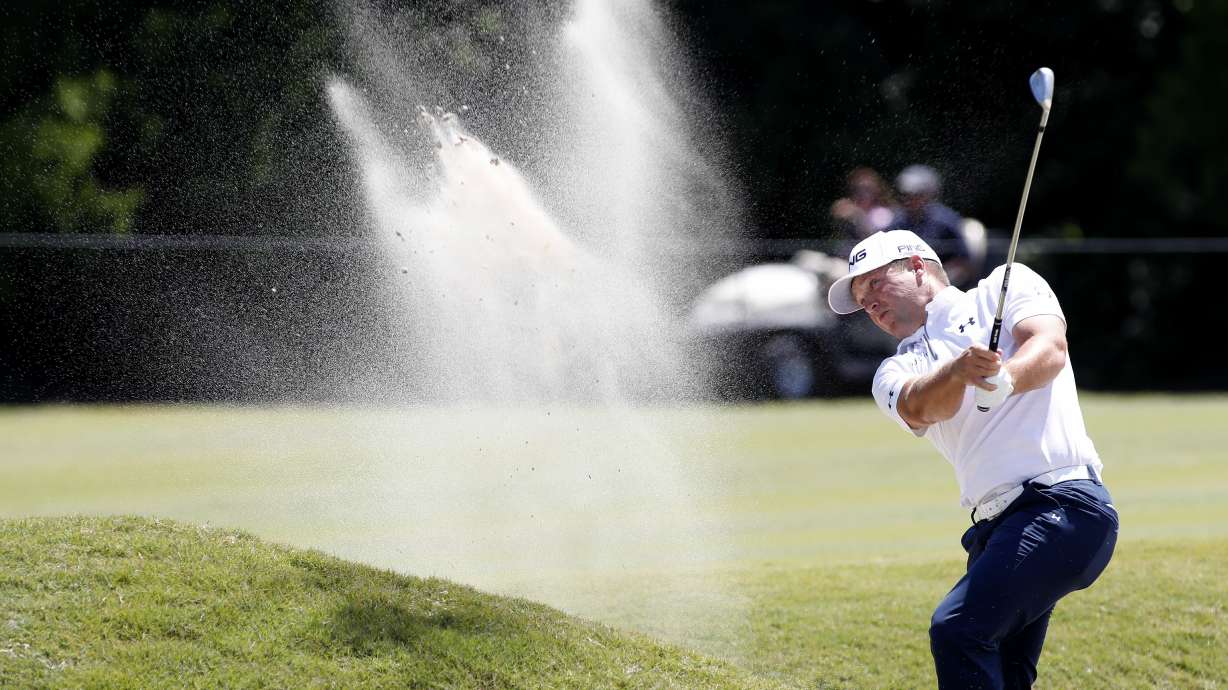 Daniel Summerhays hits out of the sand to the eighth green during the final round of the PGA Zurich Classic golf tournament's two-man team format at TPC Louisiana in Avondale, La., April 29, 2018. Summerhays recently come out of retirement and will play in next week's Utah Championship at Oakridge Country Club.