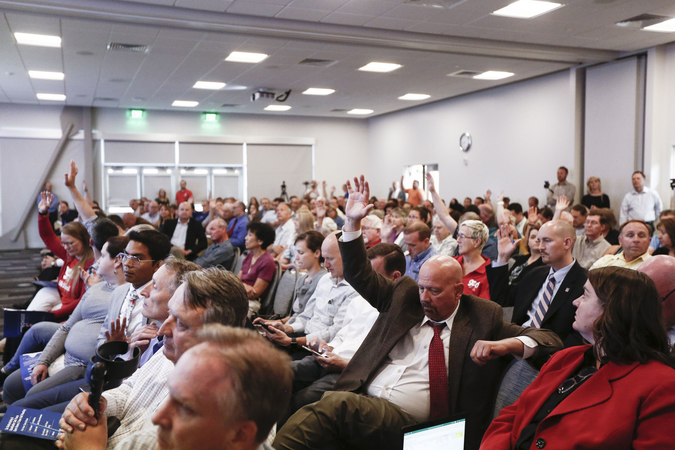 Business owner Steve Pluim raises his hand in agreement with a statement during a town hall meeting conducted by the Tax Restructuring and Equalization Task Force at the Element Event Center in Kearns on Thursday, June 27, 2019. The meeting was one of eight meant to inform attendees about the issue and answer their questions. (Photo: Silas Walker, KSL)