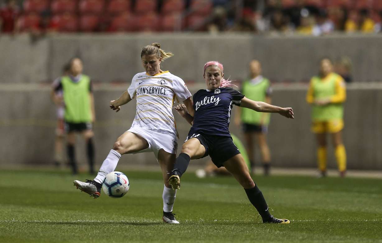 Utah Royals FC defender Becca Moros (3) fights with Seattle Reign FC Addison Steiner (27) for control of the ball during their match at Rio Tinto Stadium in Sandy on Friday, June 28, 2019. (Photo: Silas Walker, KSL)