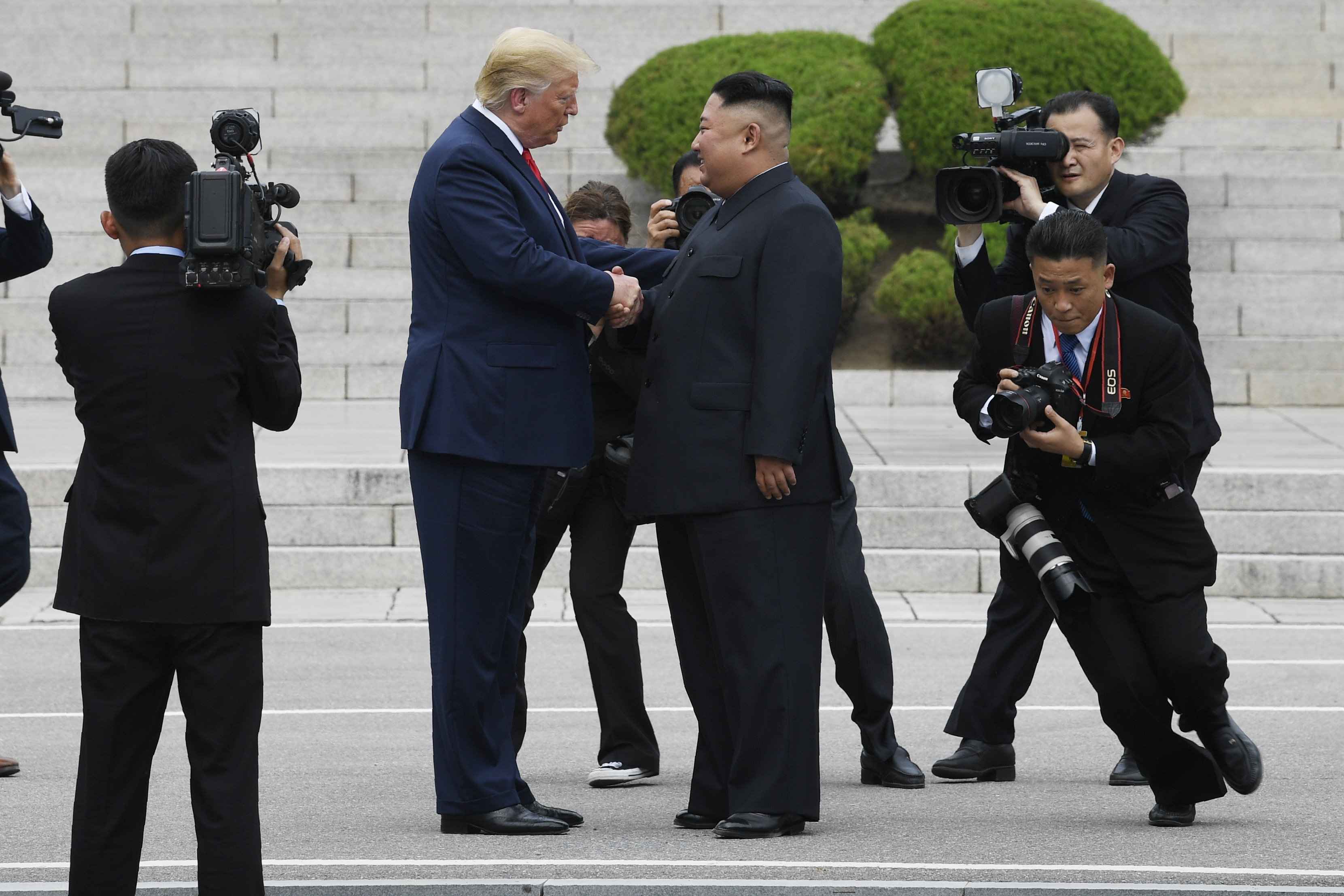 At DMZ, step into history for Trump as he offers hand to Kim