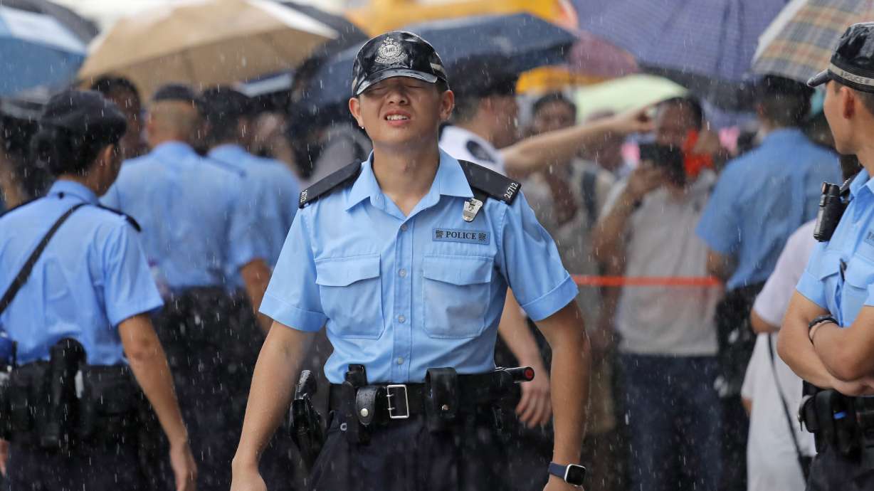 Hong Kong protesters block roads before handover ceremony