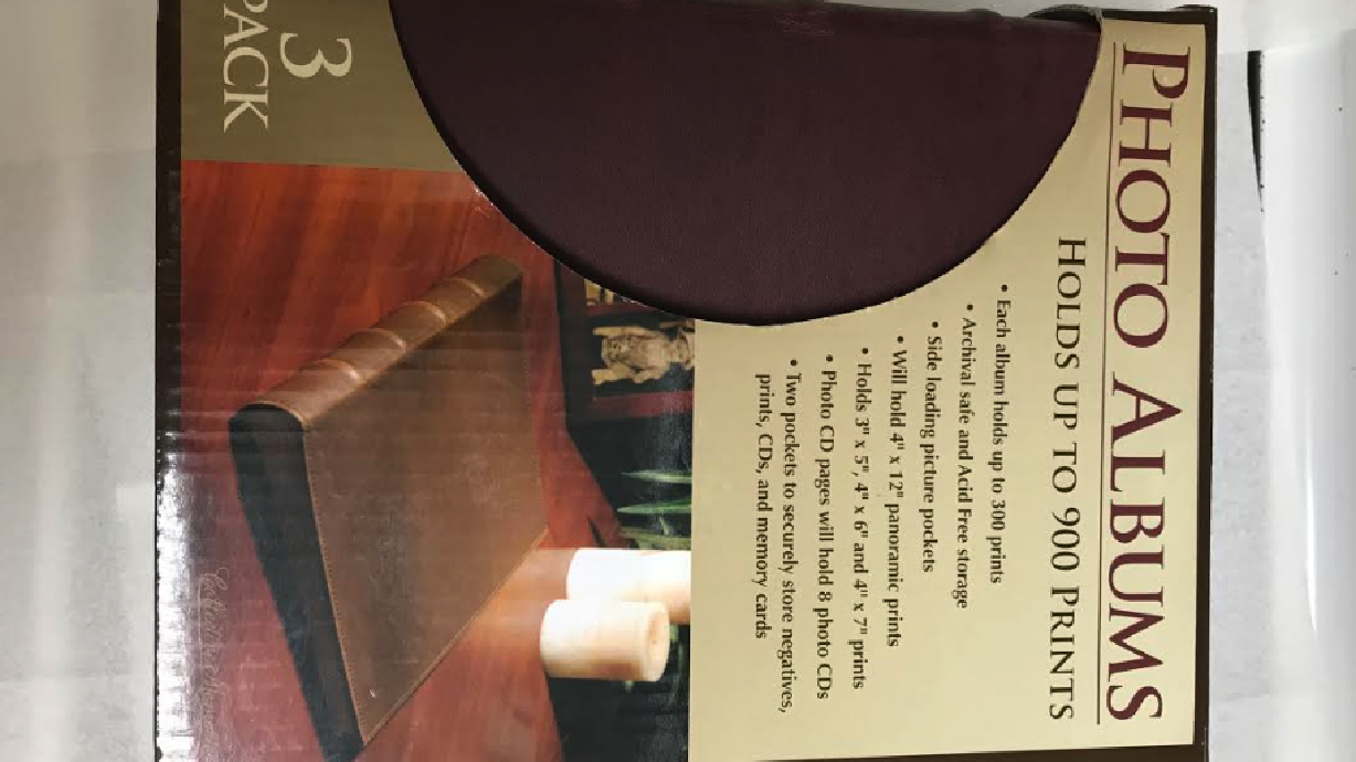 Couple who found albums full of photos at the DI successfully returns them to owner