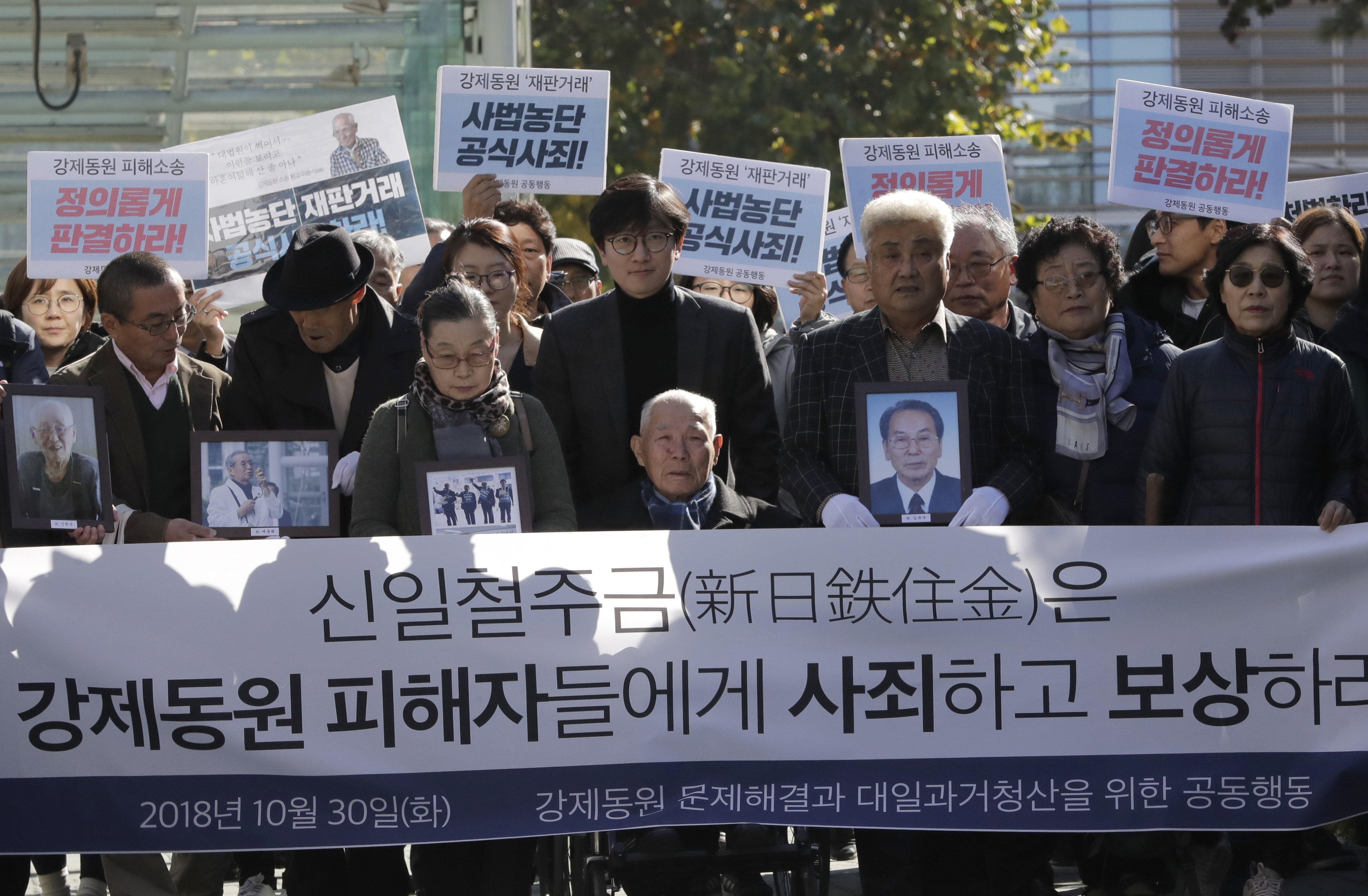 The Latest: SKorea summons Japanese envoy over export curbs