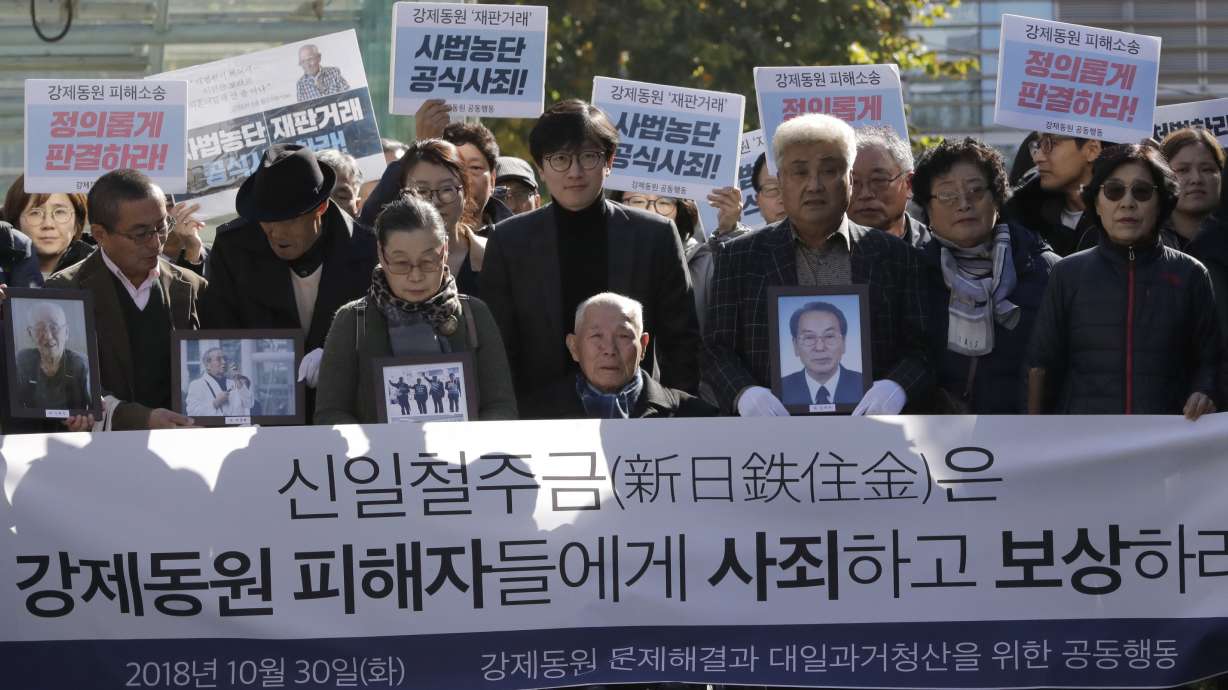 The Latest: SKorea summons Japanese envoy over export curbs