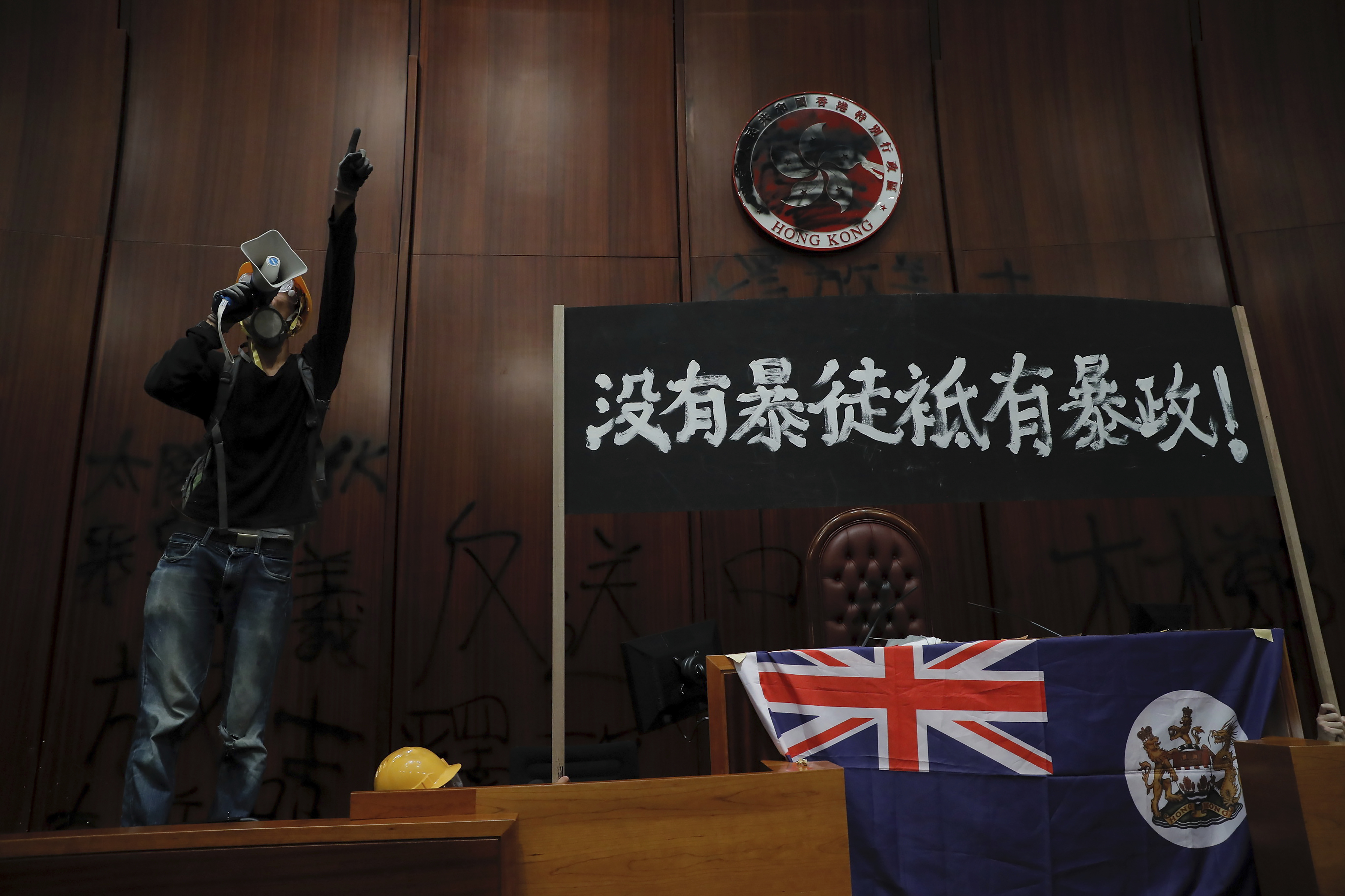 Riot police clear away protesters from Hong Kong legislature