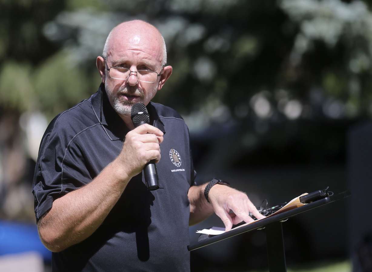 Lee Bollwinkel, director of Salt Lake City Parks and Public Lands, speaks during a dedication ceremony on Tuesday, July 2, 2019, for a new granite marker at the Salt Lake City Cemetery memorializing those who died in the state’s first insane asylum. (Photo: Kristin Murphy, KSL)