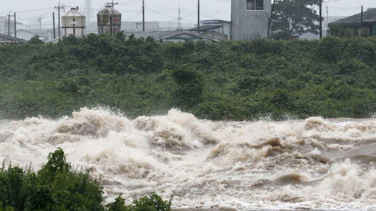 Heavy rain in south Japan causes floods, mudslides, blackout