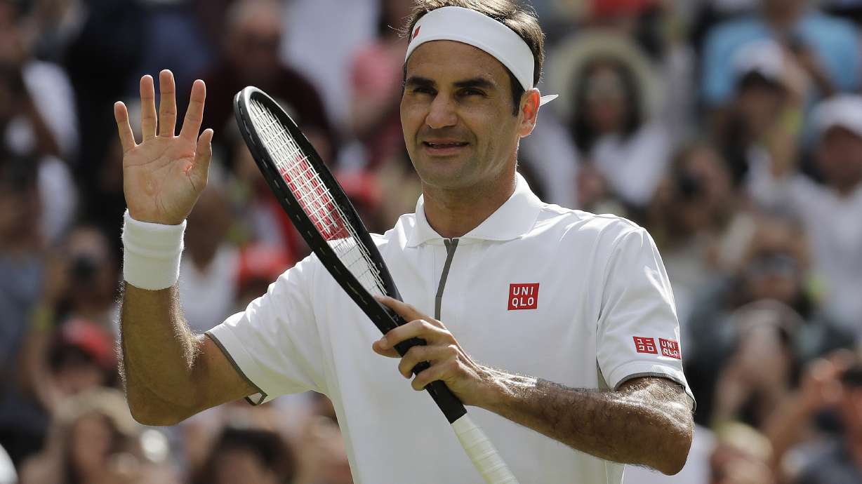 The Latest: Andy Murray wins in doubles at Wimbledon