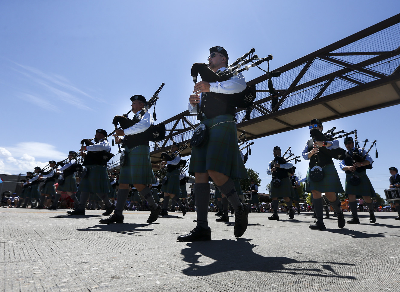 Members of the Utah Pipe Band perform as they walk the parade route during the West Jordan Stampede Grand Parade on Thursday, July 4, 2019, in West Jordan. (Photo: Colter Peterson, Deseret News)