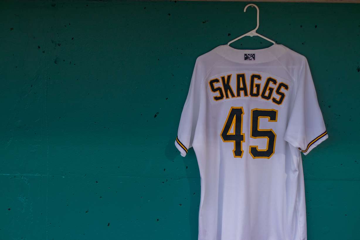 A jersey honoring Tyler Skaggs hangs in the Bees' dugout during the team's game against El Paso at Smith's Ballpark on Thursday, July 4, 2019. Skaggs, who died on Monday, pitched for the Bees in 2014, 2016 and 2017. (Photo: Carter Williams, KSL.com)
