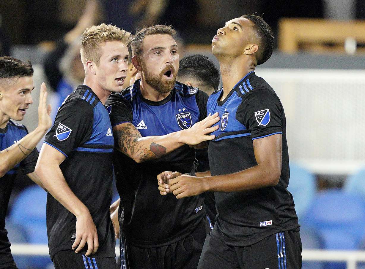 San Jose Earthquakes forward Danny Hoesen (9) celebrates his goal with teammates Jackson Yueill, left, and Guram Kashia, center, during the second half against Real Salt Lake in an MLS soccer match Saturday, July 6, 2019, in San Jose, Calif. (AP Photo/Tony Avelar)