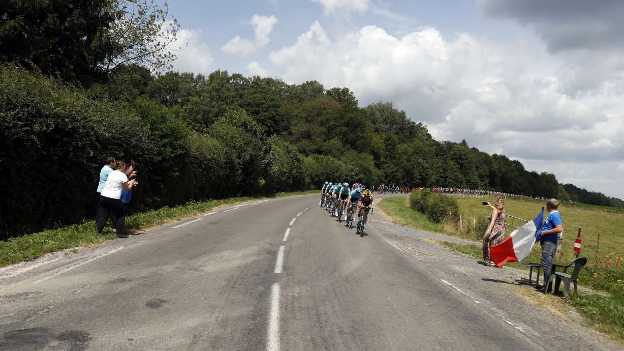Working class pride and bubbly on the Tour de France route