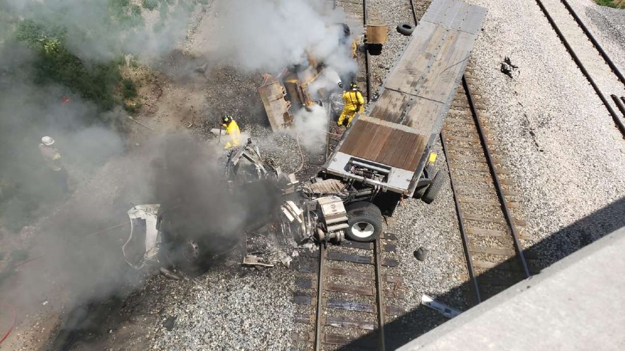 Southbound I-15 ramp reopens after semitruck goes off bridge in North Salt Lake