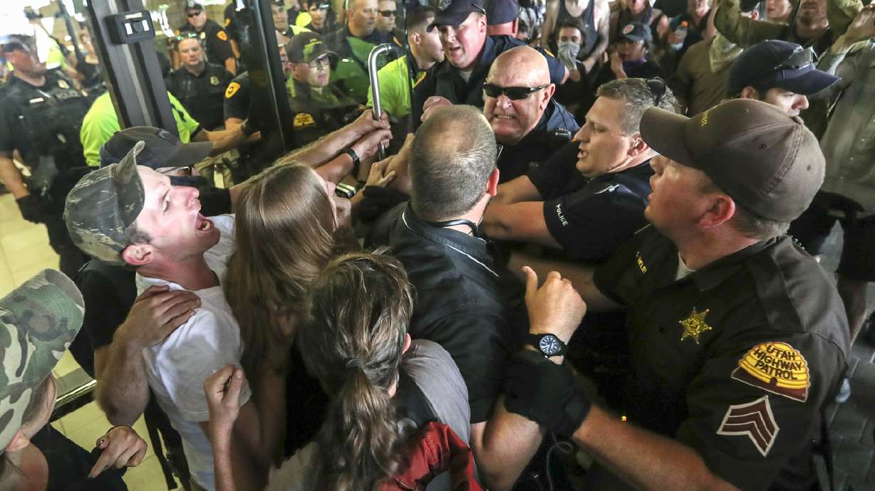 Protests over Utah Inland Port escalate to violence as groups storm building
