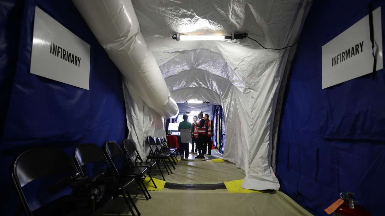 The Latest: 200 unaccompanied kids in Border Patrol custody