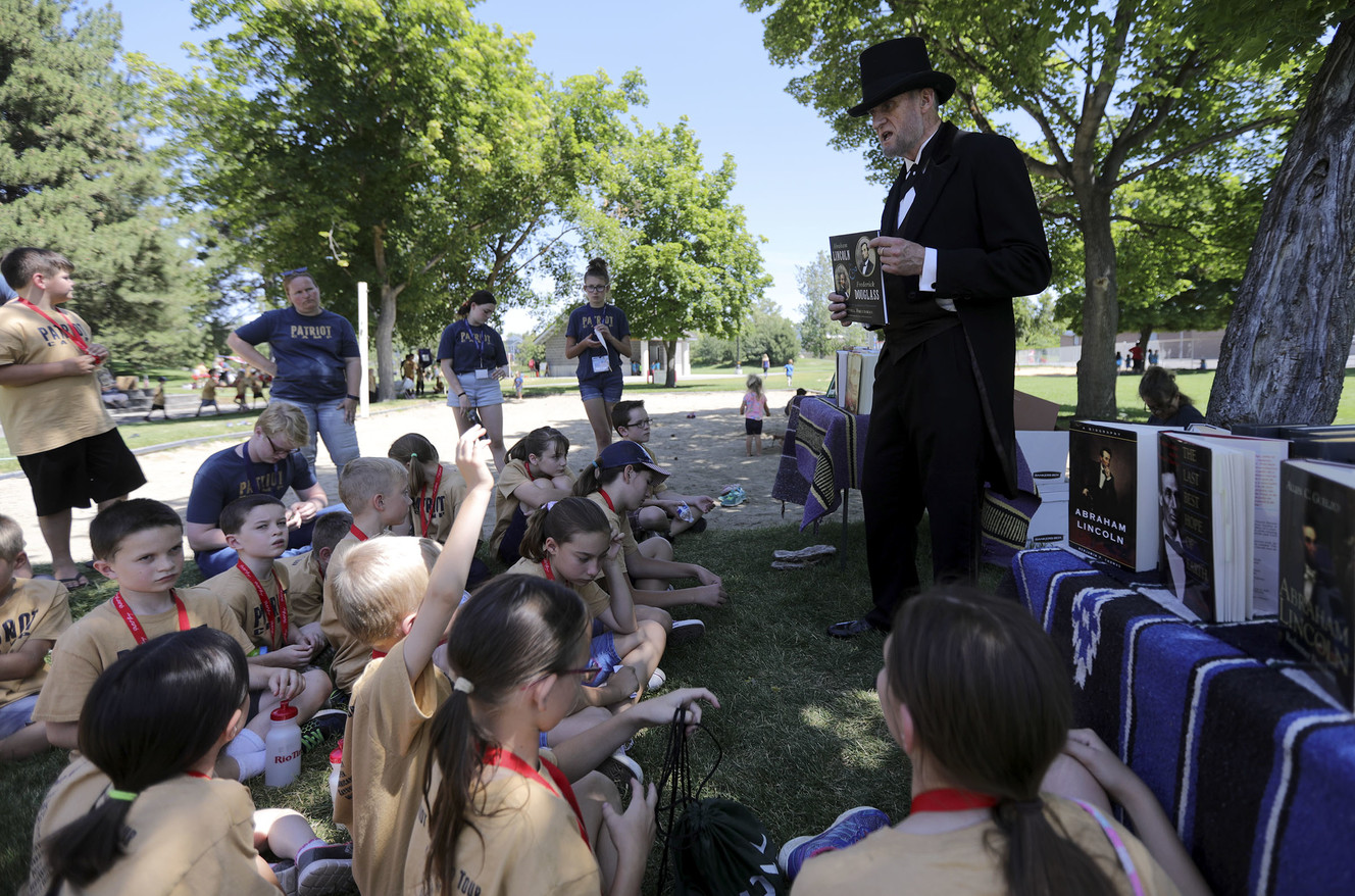 Grant R. Clayton talks to campers about Abraham Lincoln during Patriot Camp at Murray Park in Murray on Wednesday, July 10, 2019. (Photo: Kristin Murphy, KSL)