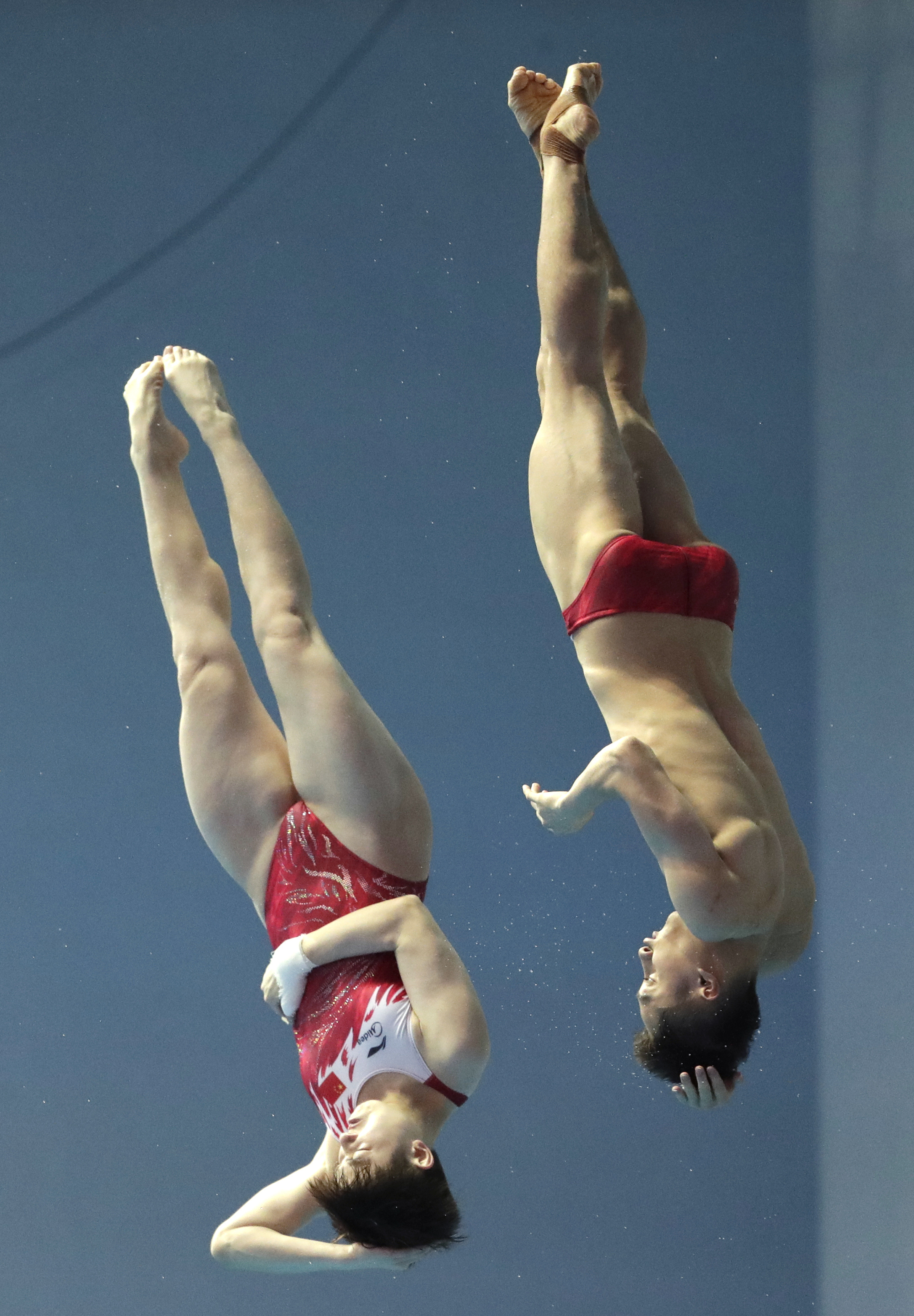 China wins first 3 diving golds at worlds; Bacon gets silver