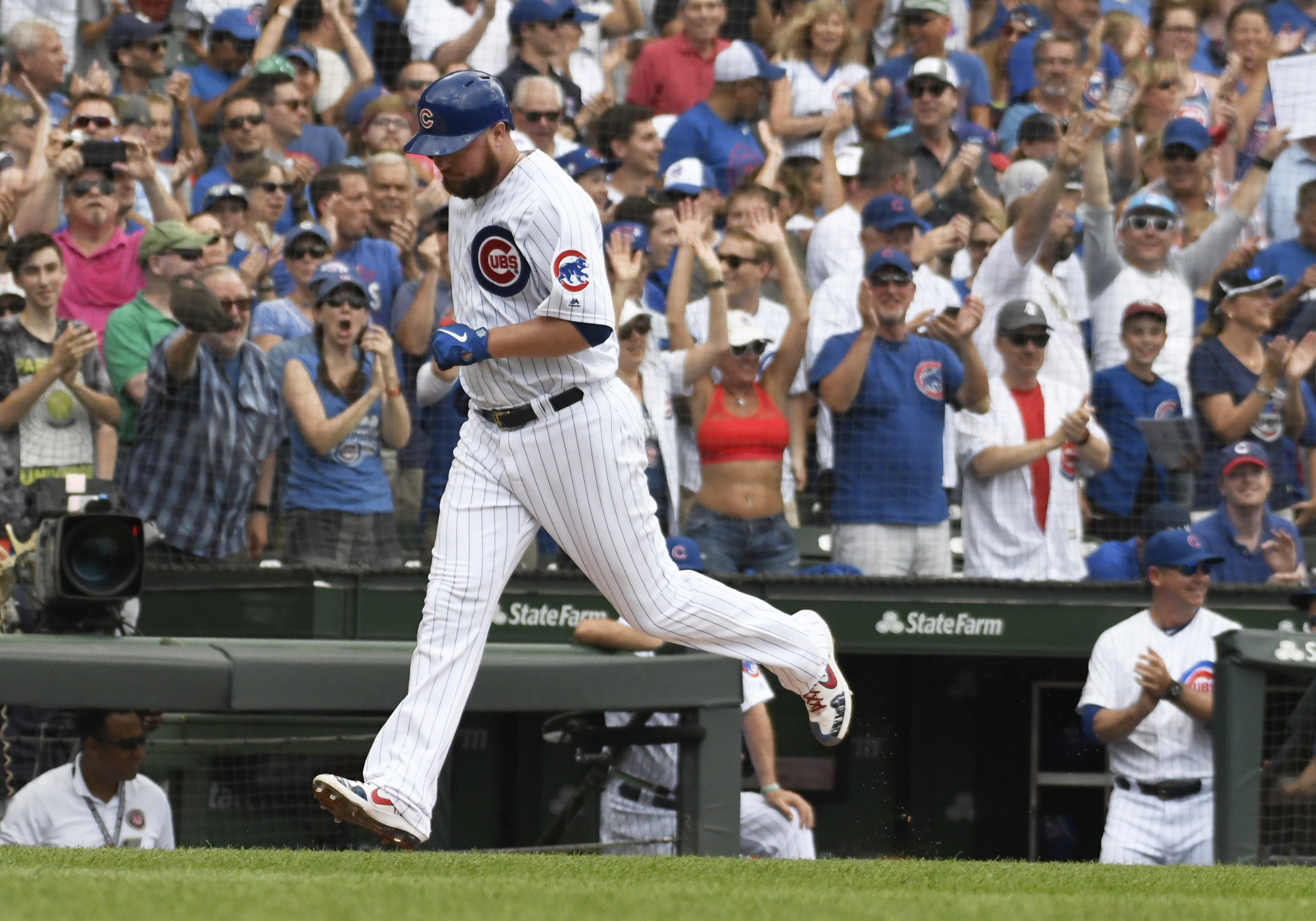 Lester homers, drives in 3, pitches Cubs past Pirates 10-4