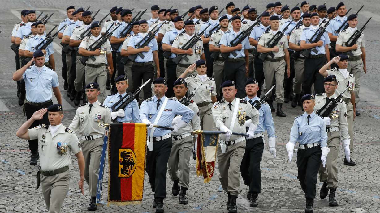 France trumpets shared European defense on Bastille Day