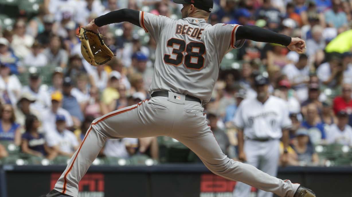 Beede's pitching, hitting lead Giants past Brewers 8-3