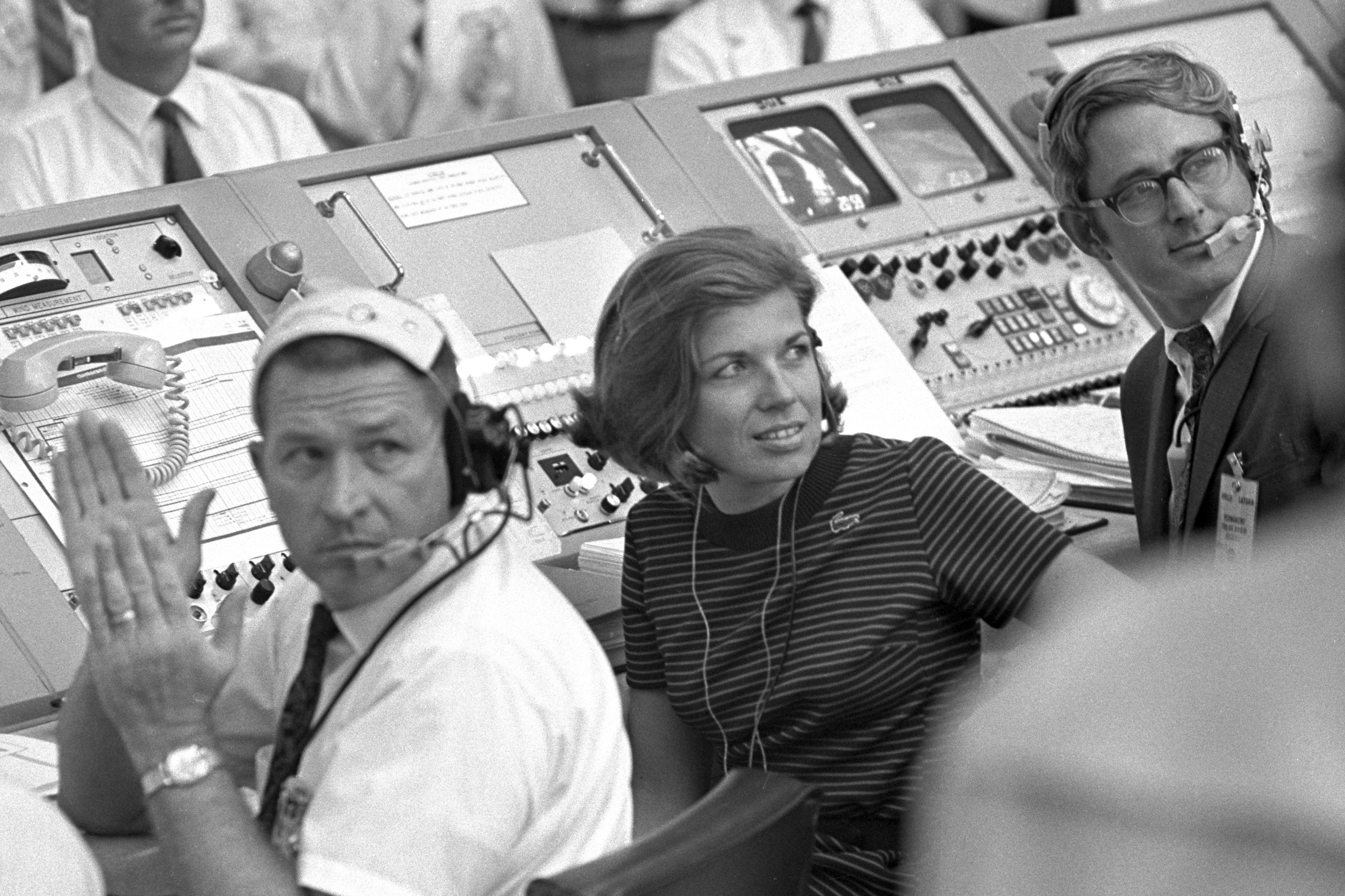 In this July 16, 1969 photo provided by NASA, JoAnn Morgan watches from the launch firing room during the launch of Apollo 11 in Cape Canaveral, Fla. Morgan, who worked on the Apollo 11 mission in 1969, went on to become the Kennedy Space Center's first female senior executive. She retired in 2003. (NASA via AP)