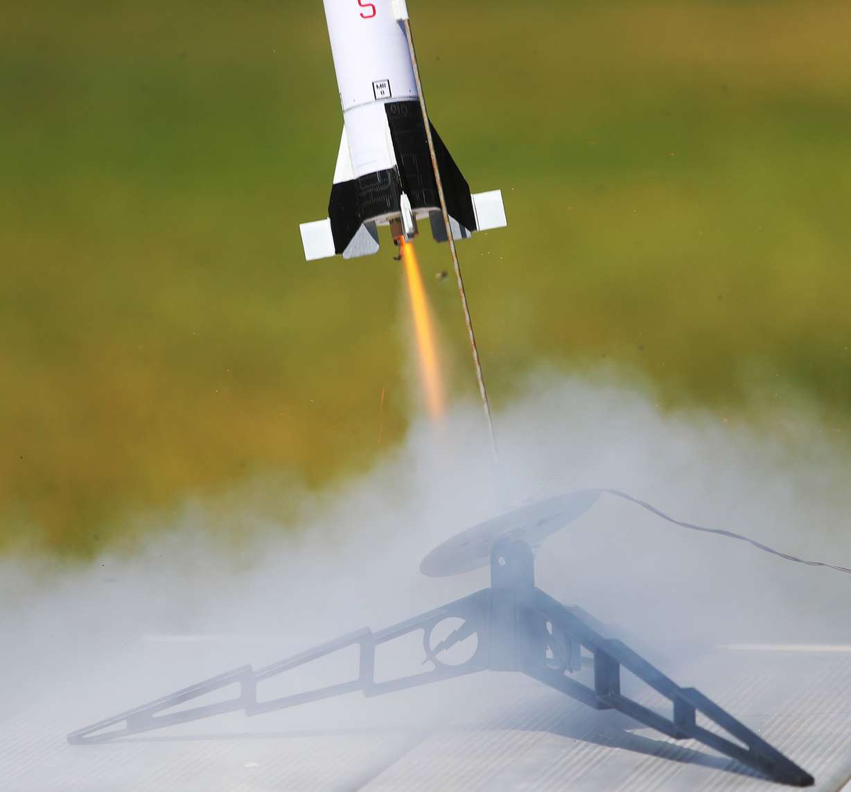 A model of the Saturn V rocket lifts off from Veterans Memorial Park in West Jordan on Tuesday, July 16, 2019, during a worldwide celebration of the 50th anniversary of the Apollo 11 mission. (Photo: Scott G Winterton, KSL)