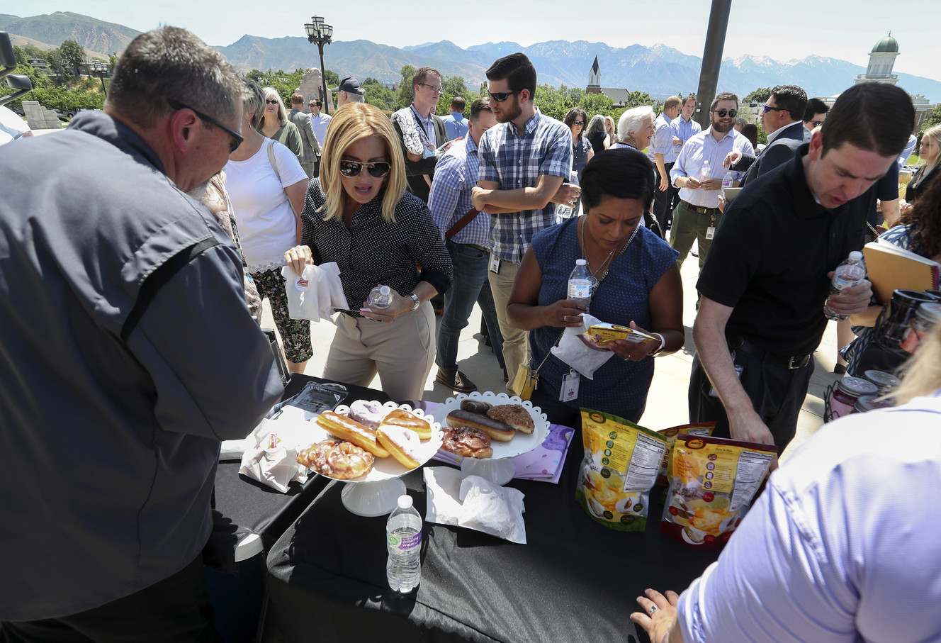 Guests sample Utah food products during the Flavors of Utah send-off at the Capitol in Salt Lake City on Friday, July 19, 2019. Flavors of Utah, an annual Pioneer Day event at the Russell Senate Office Building in Washington, D.C., shares the best Utah products and services on a national stage including Kodiak Cakes, Butcher’s Bunches, Pepperlane, Gusto Brazil, Julieann Caramels, Taffy Town, Lower Foods, Heber Valley Cheese, Creminelli Fine Meats, Madbrook Donuts and more. (Photo: Steve Griffin, KSL)